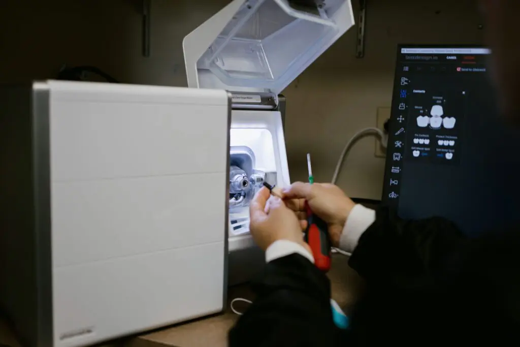 a person working on a machine
