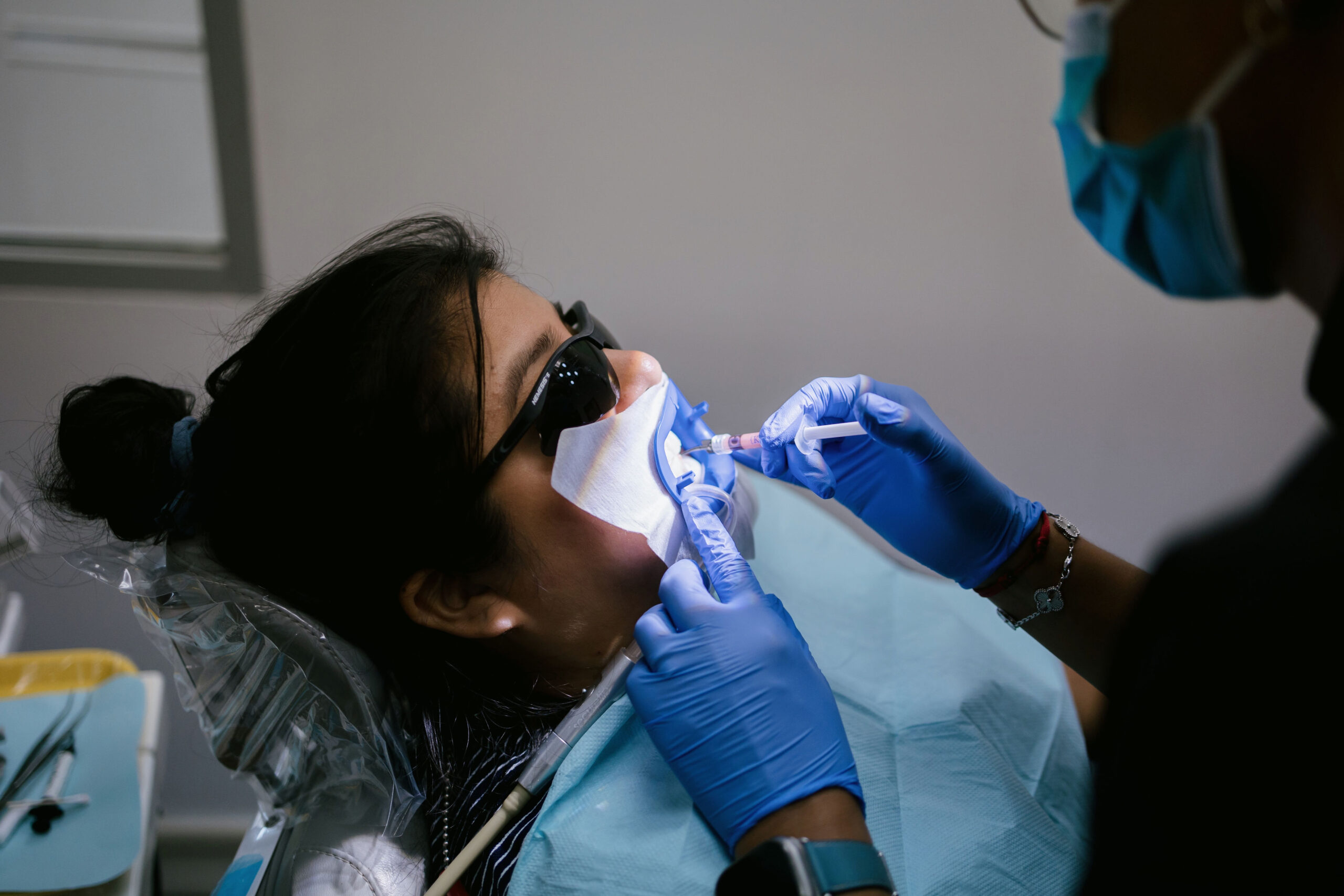 a woman getting her teeth checked