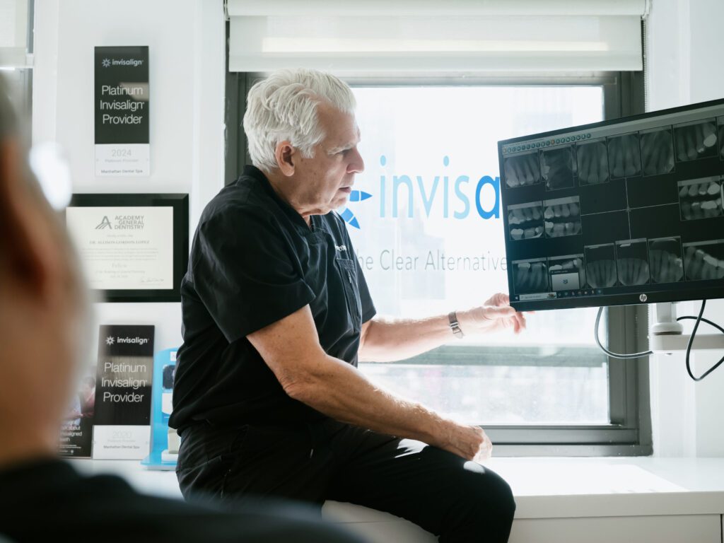 a man looking at a computer screen