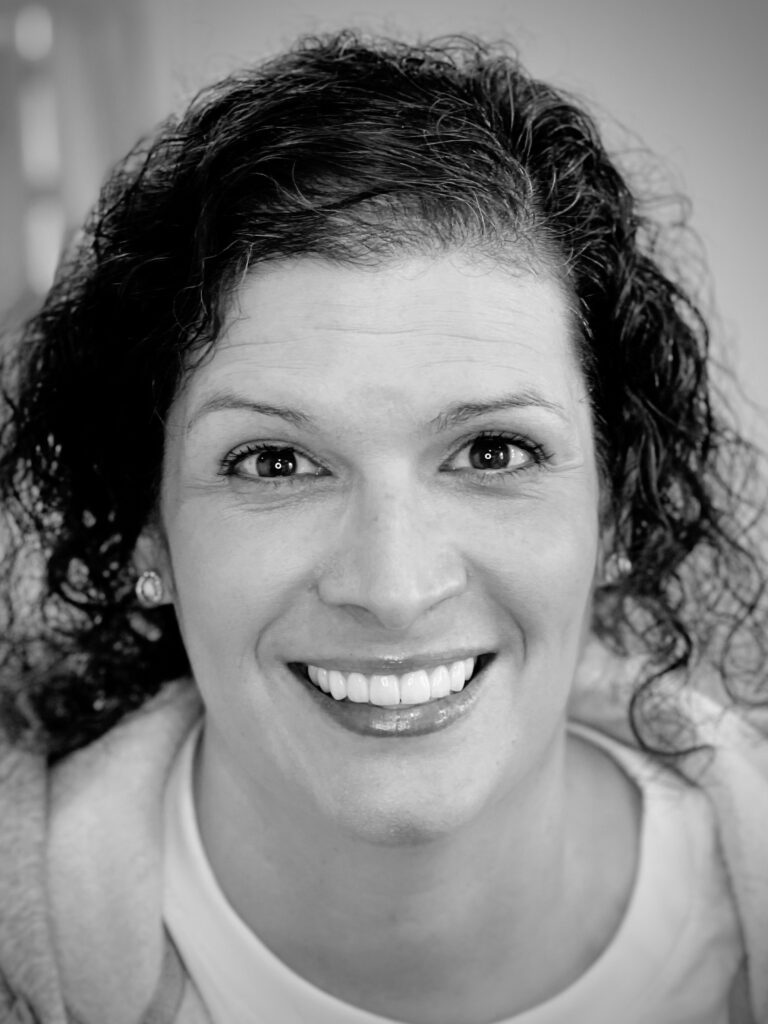 a close-up of a woman smiling