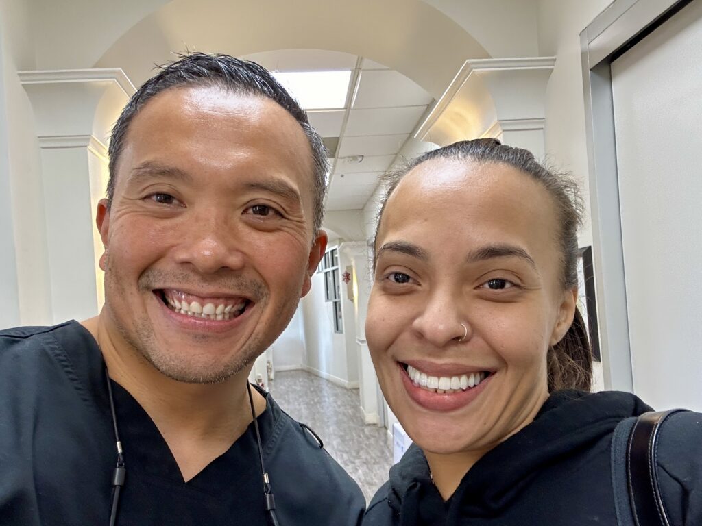 Dr. Vargas and female patient smiling for a selfie