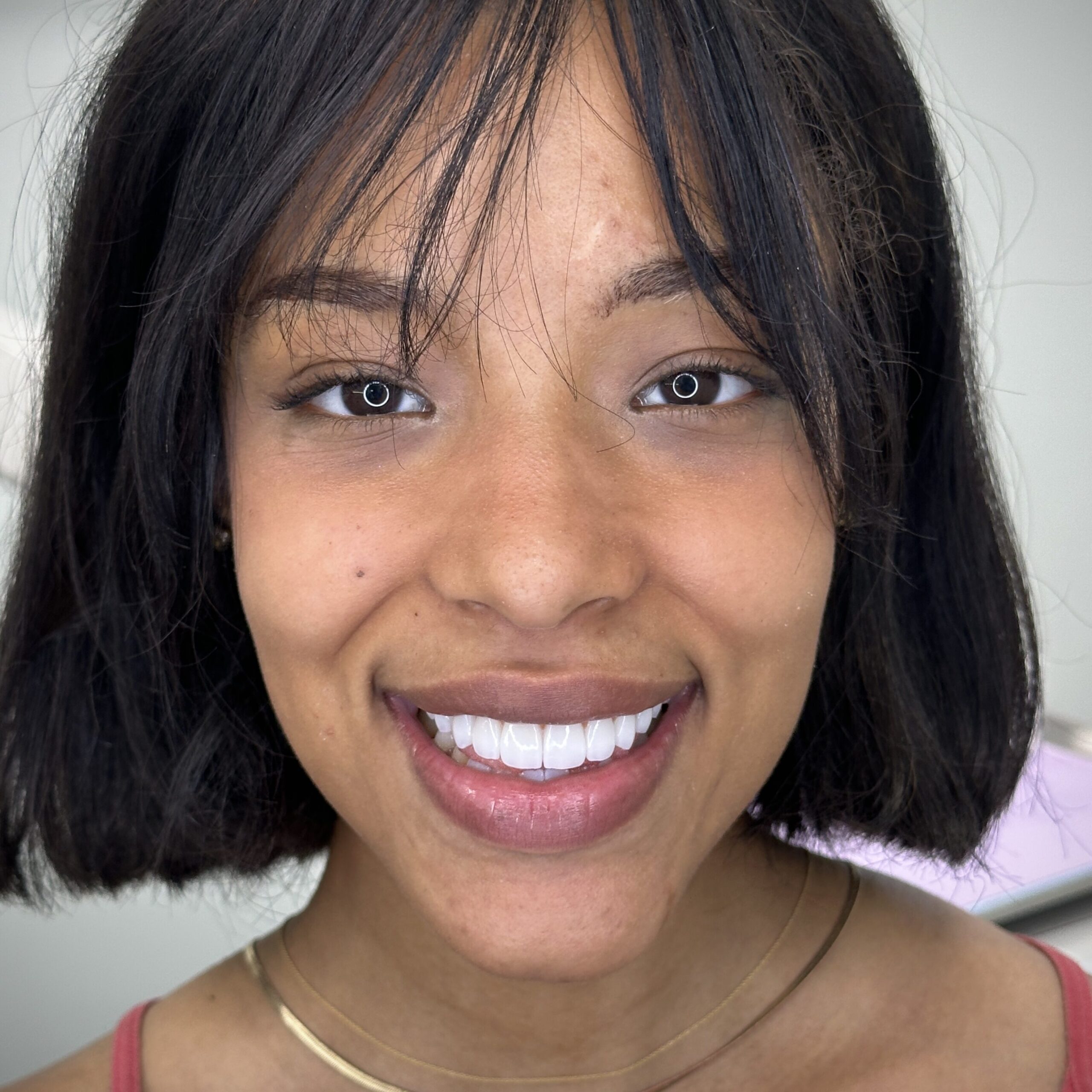 a woman smiling at the camera